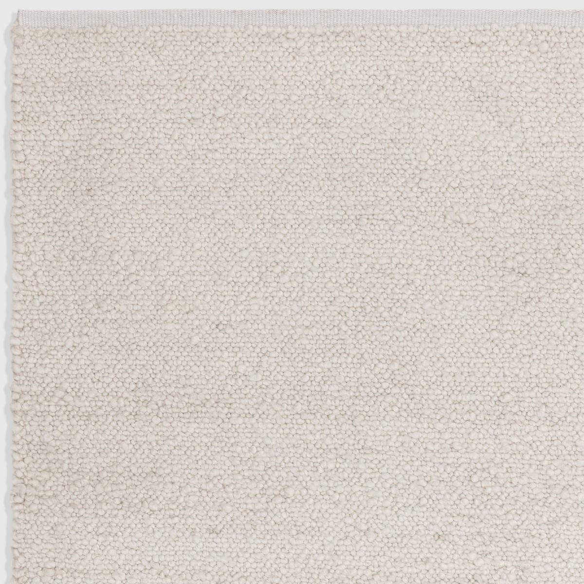 Alvo Rugs Abella ivory boucle rug with a soft hand-woven polyester texture and boho style flatweave design