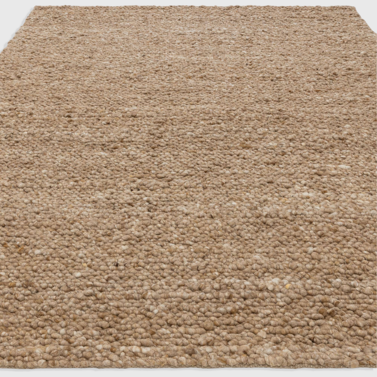 Alvo Rugs Adio Honey rug featuring a chunky beige wool boucle texture with a soft loop pile finish.