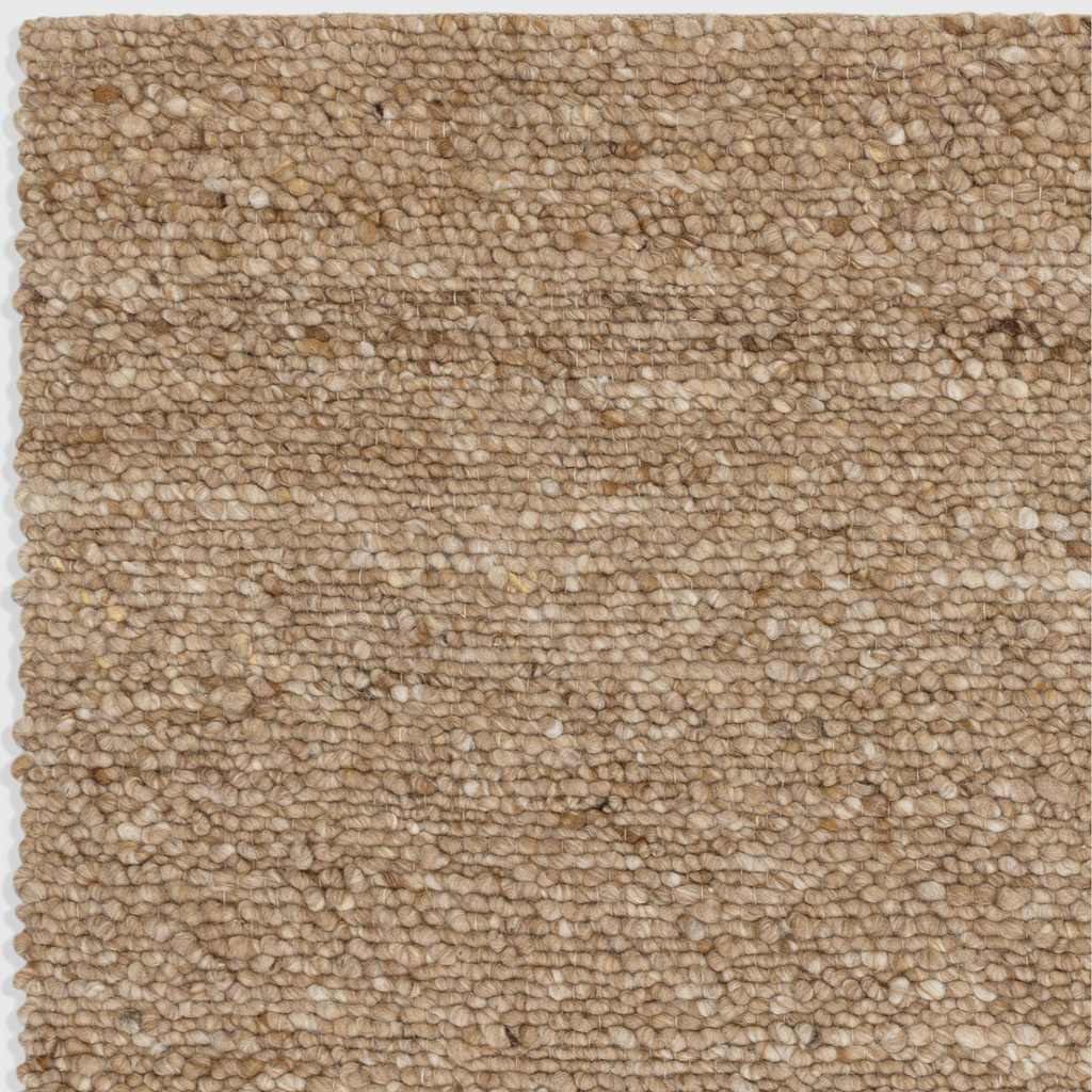 Alvo Rugs Adio Honey rug featuring a chunky beige wool boucle texture with soft natural tonal variations.