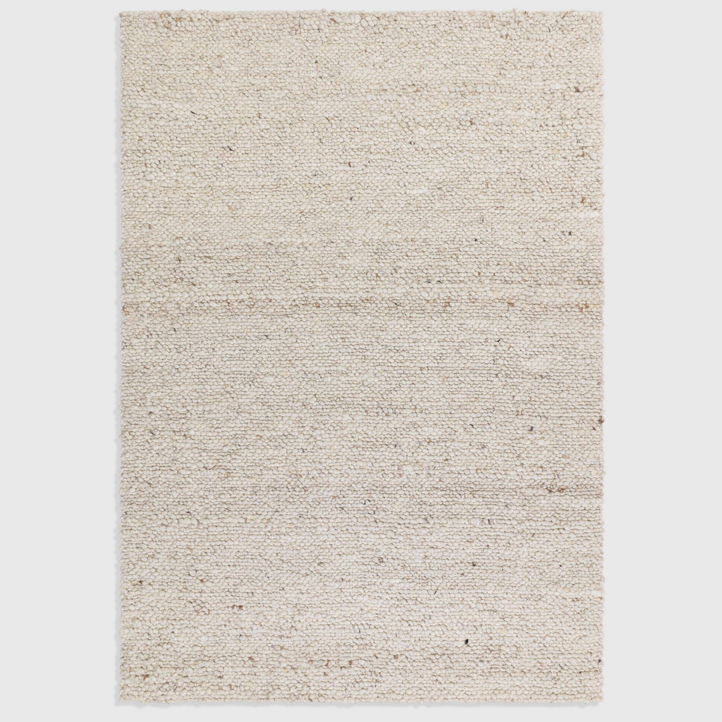 Alvo Rugs Adio ivory wool rug with a chunky hand-woven boucle texture and a soft loop pile finish.