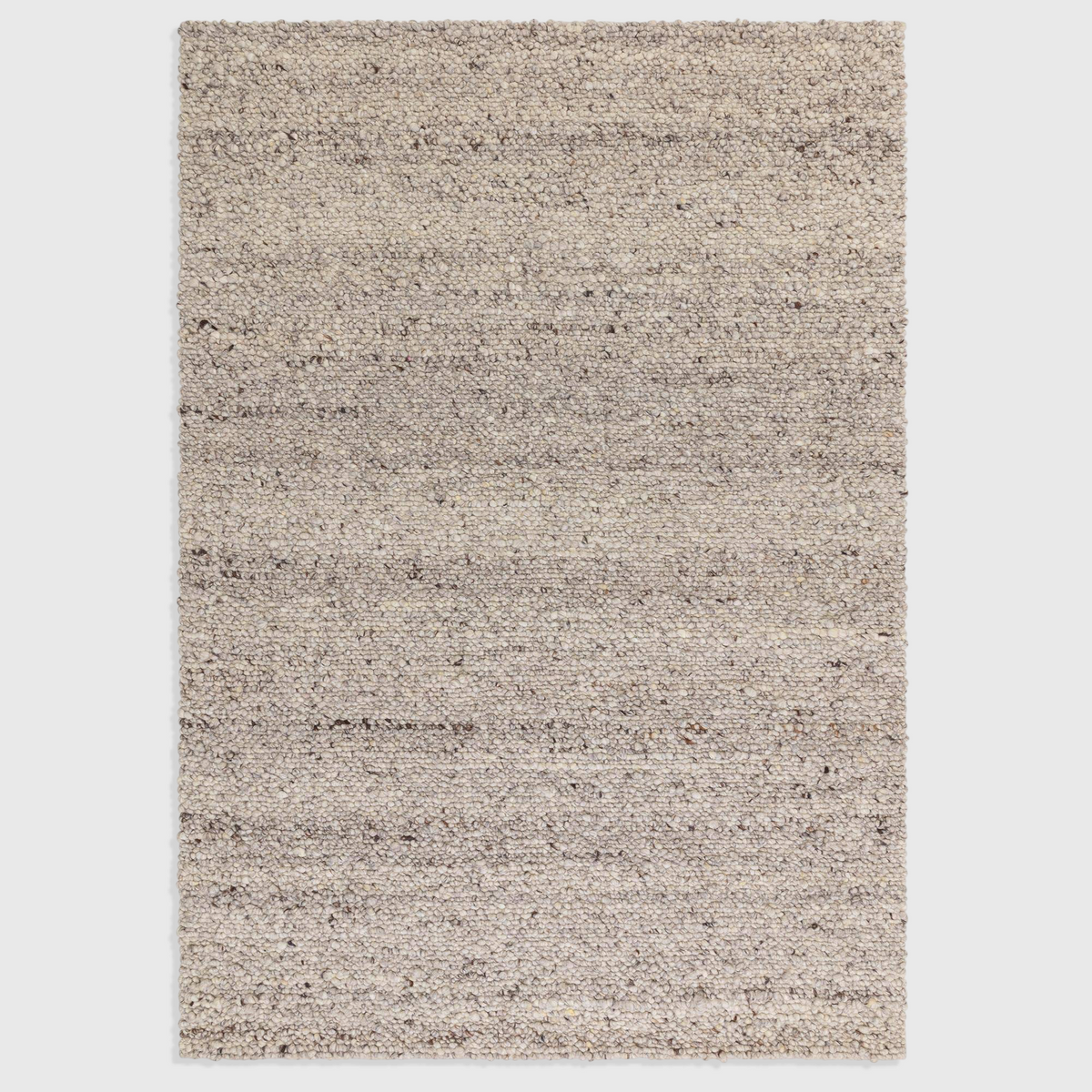 Alvo Rugs Adio silver hand-woven wool rug with a chunky boucle loop pile texture in neutral grey tones.