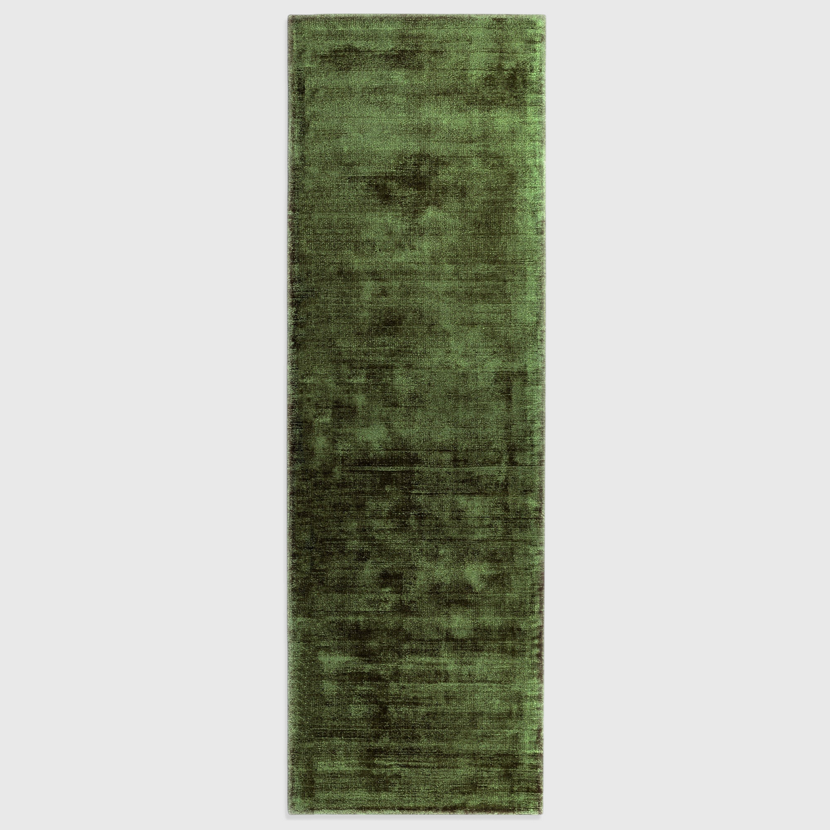 Alvo Rugs Blayde green hand-woven viscose rug with a vintage tip-sheared finish and soft loop pile texture.