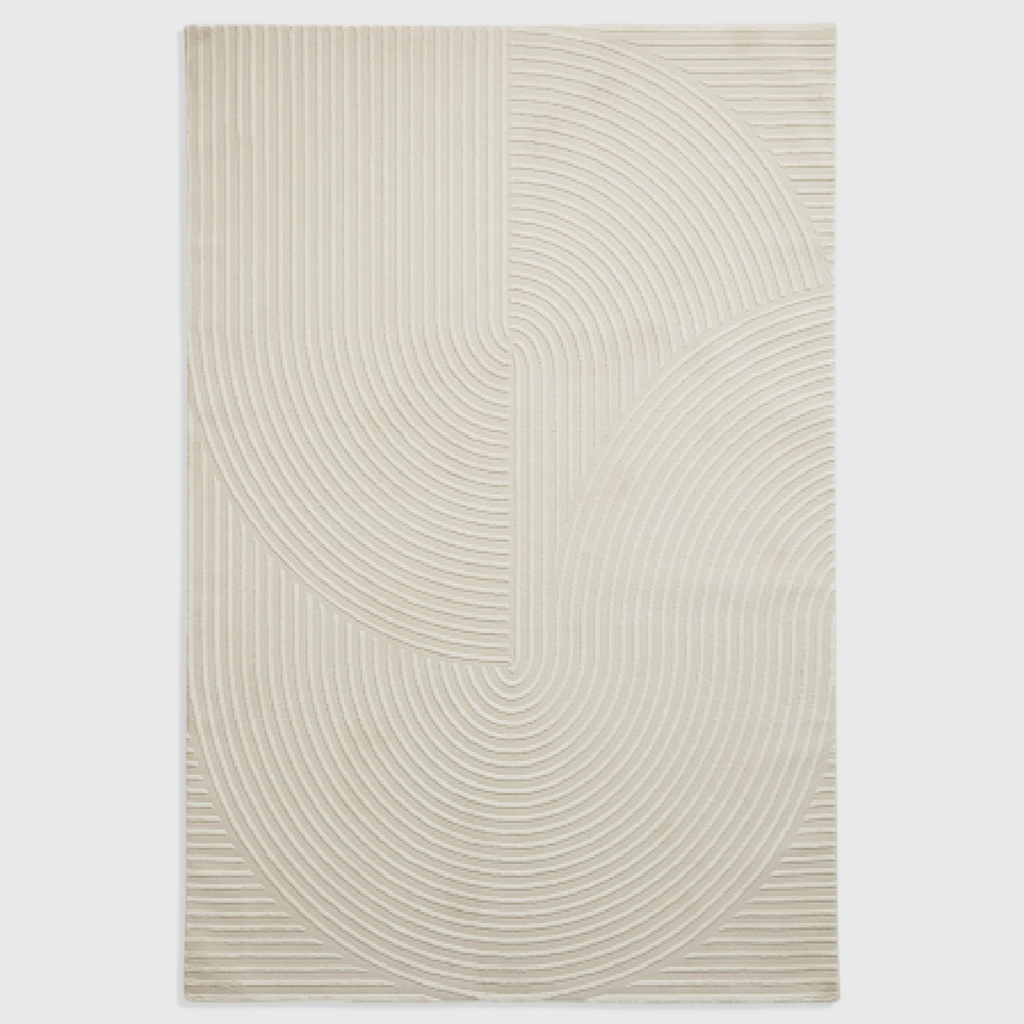 Alvo Rugs Fiorentina cream washable rug with a high-low carved arch pattern made from soft recycled polyester.