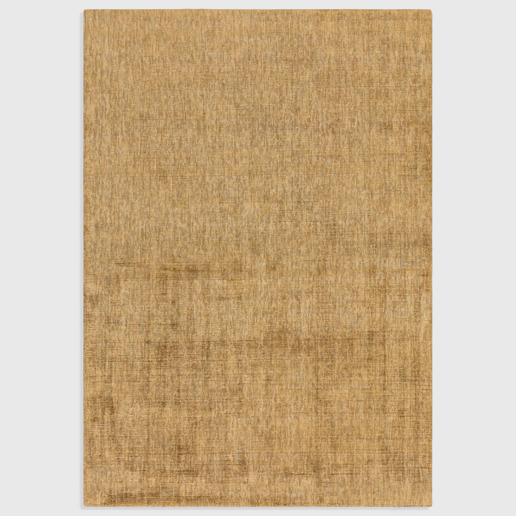 Alvo Rugs Astonia ochre yellow hand-woven viscose rug with a subtle sheen and soft loop pile texture.