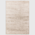 Alvo Rugs Astonia sand coloured hand woven viscose rug with a subtle sheen and plain loop pile texture.