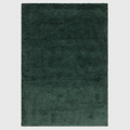 Alvo Rugs Atelier Emerald green shaggy rug with a thick, plush polypropylene pile and a soft, dense texture.