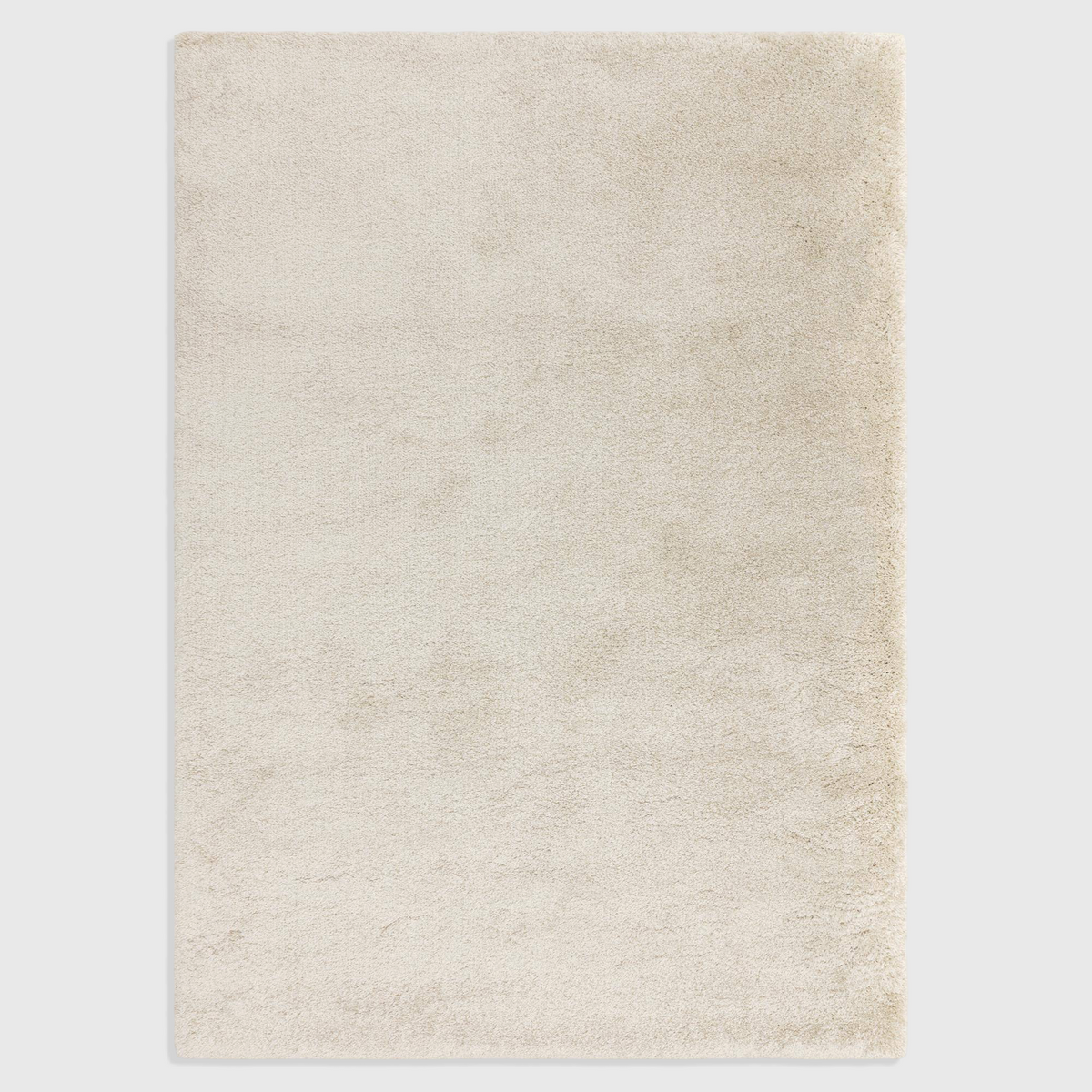 Alvo Rugs Atelier ivory shaggy rug with a thick, dense pile and soft polypropylene texture for a cozy home interior.