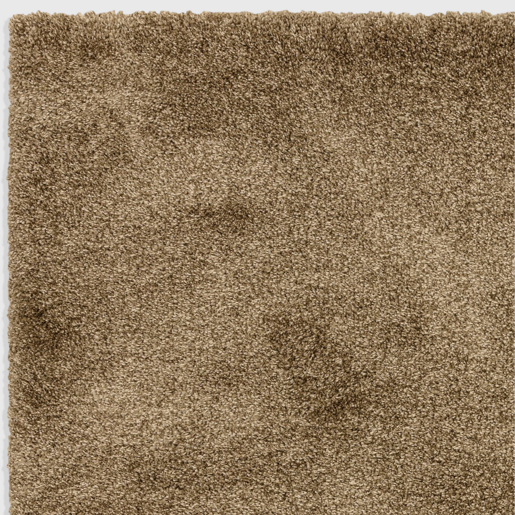 Alvo Rugs Atelier Natural rug featuring a plush beige shaggy polypropylene pile with a thick and dense texture.