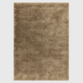 Alvo Rugs Atelier Natural rug featuring a plush beige shaggy pile made from durable machine-woven polypropylene.