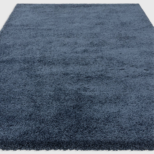 Alvo Rugs Atelier navy blue shaggy rug with a thick, plush pile and soft polypropylene texture.