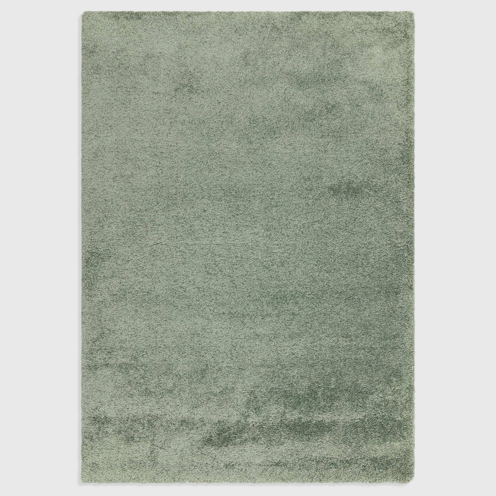 Alvo Rugs Atelier sage green shaggy rug with a thick, plush polypropylene pile for a soft and cosy floor covering.