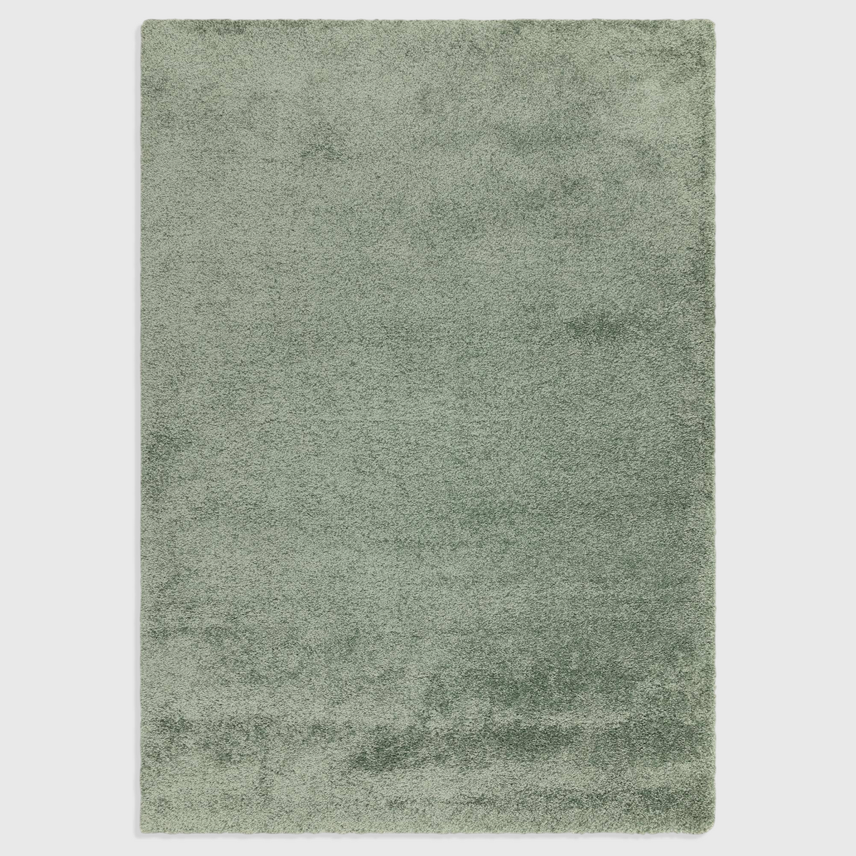 Alvo Rugs Atelier sage green shaggy rug with a thick, plush polypropylene pile for a soft and cosy floor covering.