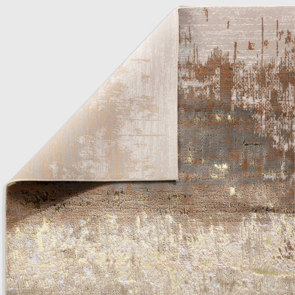 Alvo Rugs Aurorella Au01 Dune rug with abstract metallic gold and brown patterns on a soft polyester blend pile.