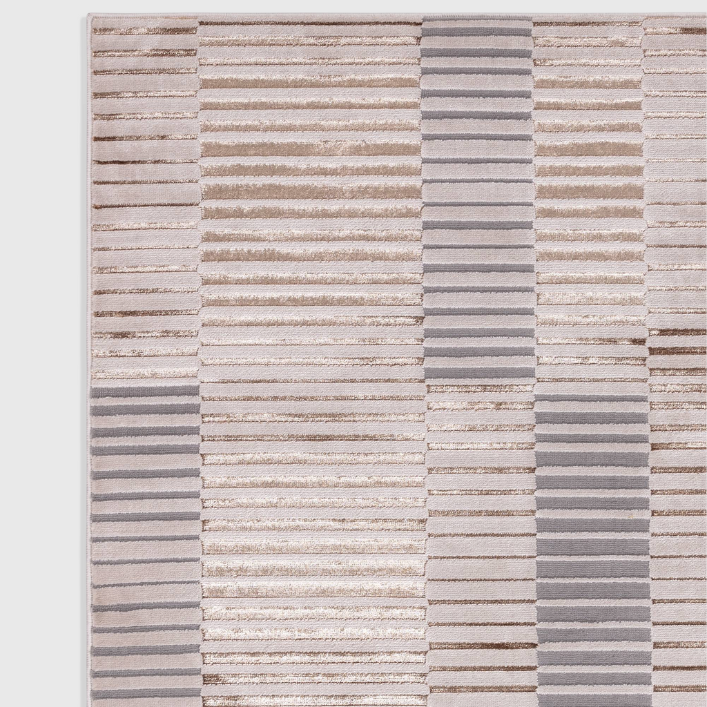 Alvo Rugs Aurorella Au14 ripple rug featuring a modern abstract striped pattern in metallic gold and grey tones.