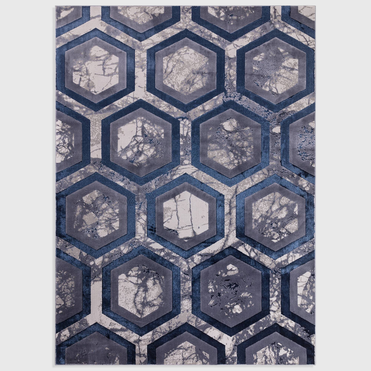Alvo Rugs Aurorella Hexagon Au19 rug featuring a modern blue and grey geometric pattern with a soft cut pile finish.