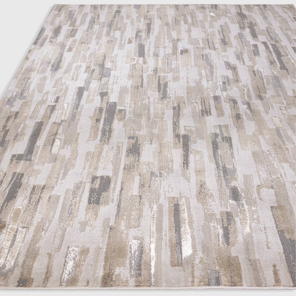 Alvo Rugs Aurorella Impression Au25 abstract area rug in metallic gold and grey tones with a soft cut pile finish.