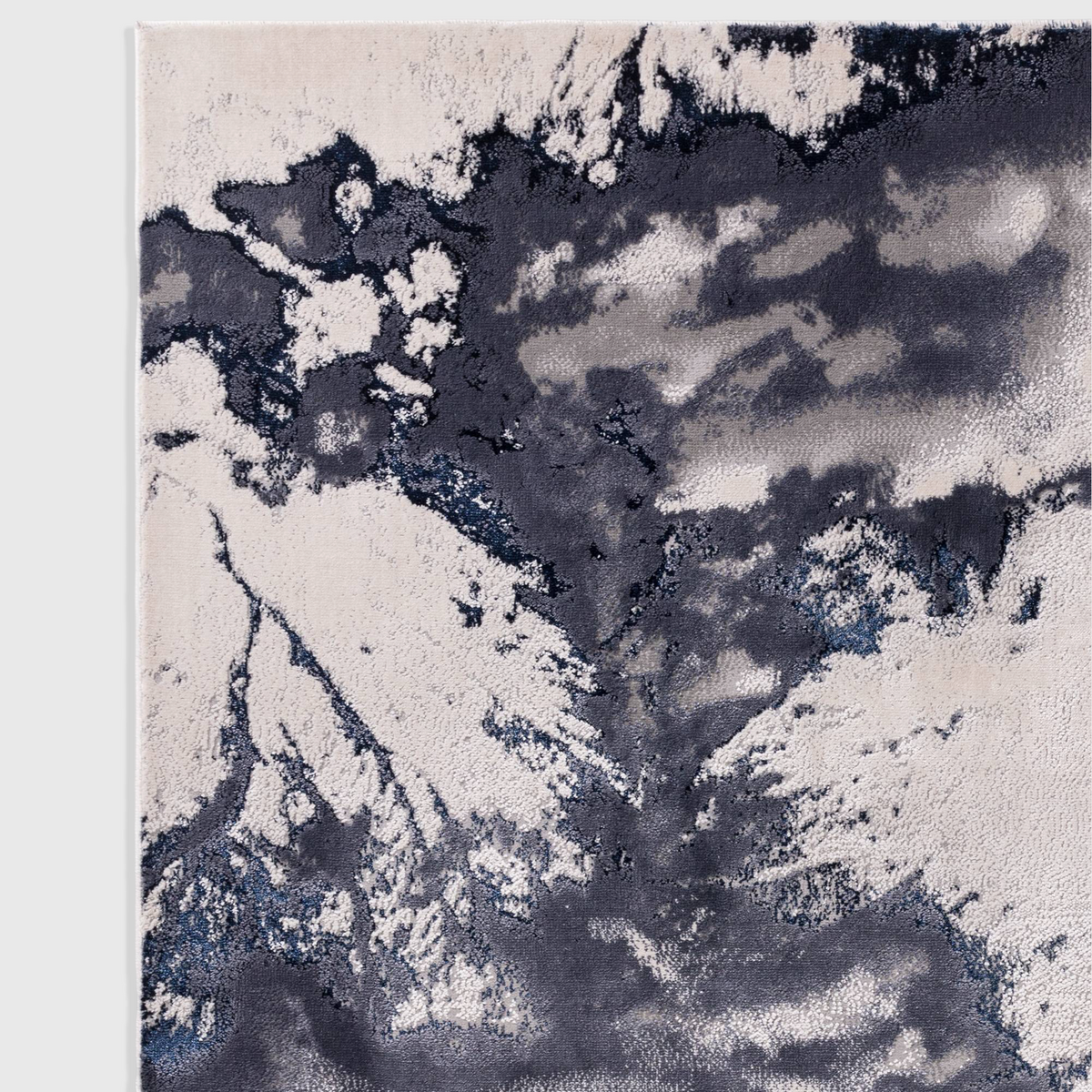 Alvo Rugs Aurorella Storm Au20 abstract rug featuring blue and grey metallic tones with a soft cut pile texture.