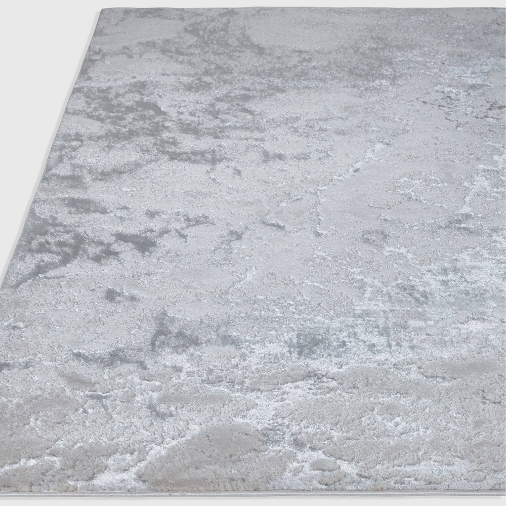 Alvo Rugs Aurorella Au03 Solar rug in grey and silver with an abstract metallic design and soft cut pile texture.