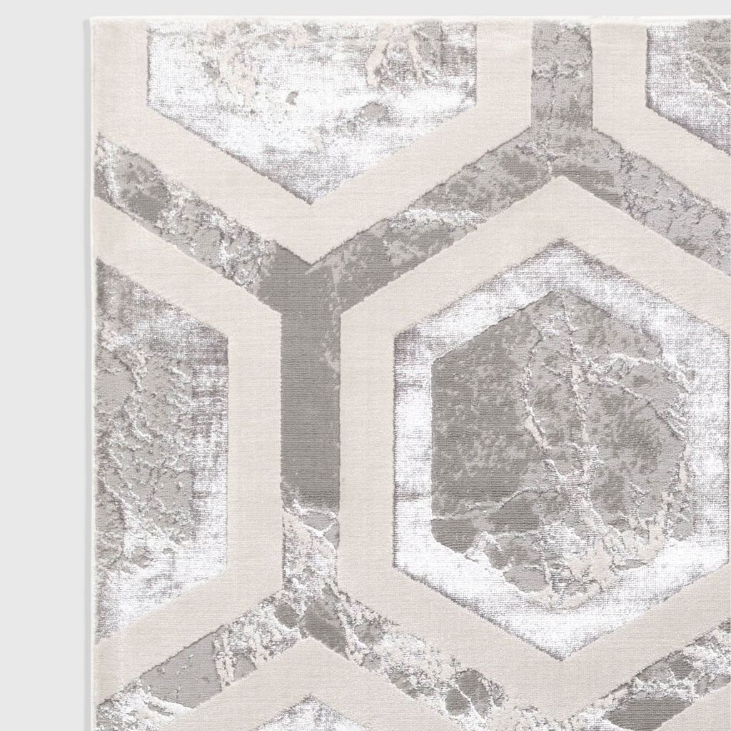 Alvo Rugs Aurorella Au12 crystal rug featuring a modern grey and silver geometric pattern with a soft cut pile finish.
