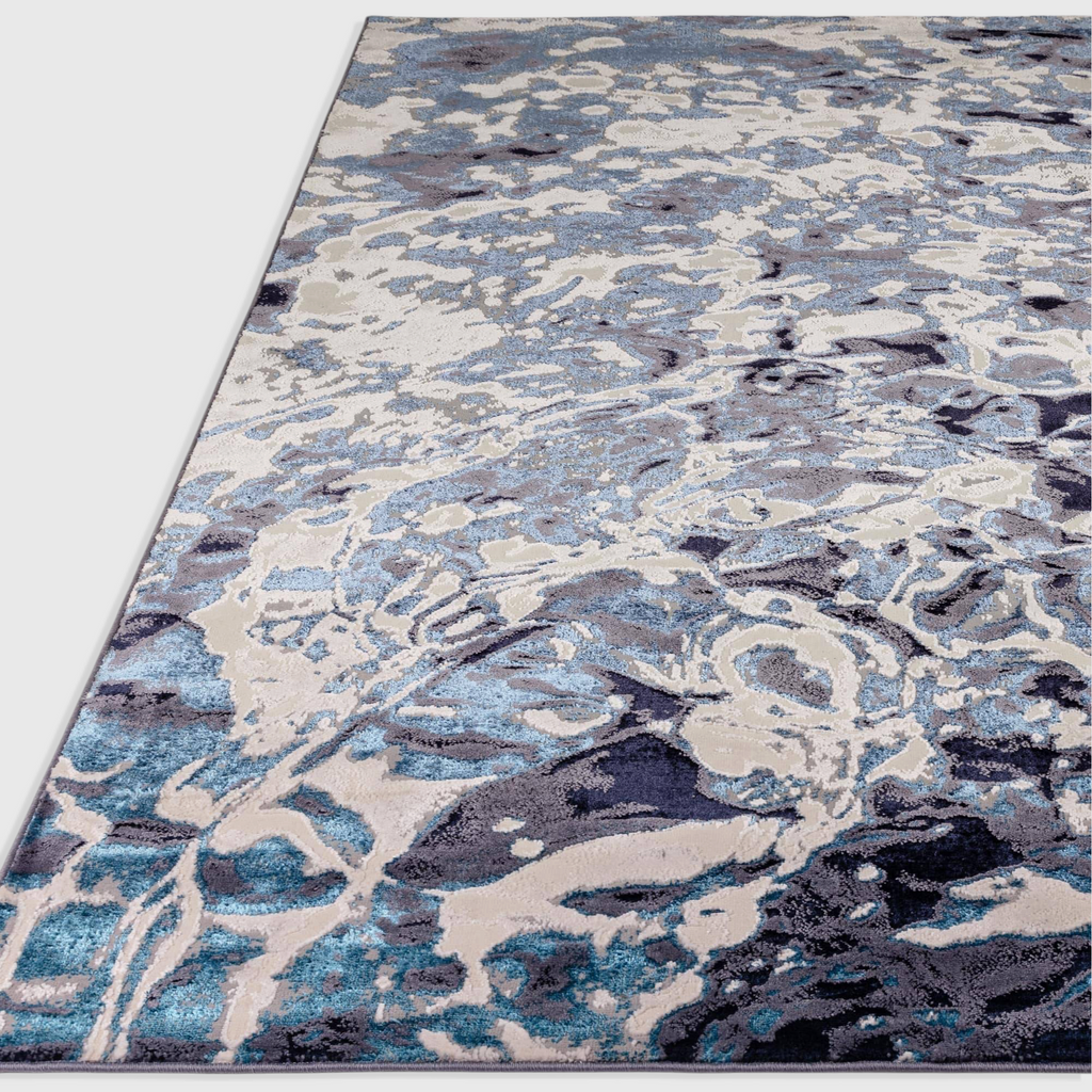 Alvo Rugs Aurorella Foam Au21 rug featuring an abstract blue and grey metallic design with a soft cut pile finish.
