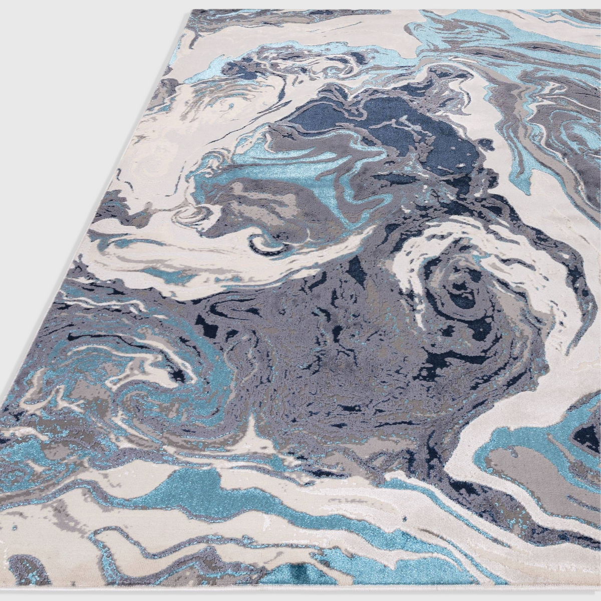 Alvo Rugs Aurorella Ocean Au18 abstract rug featuring swirling blue, grey, and white metallic patterns.
