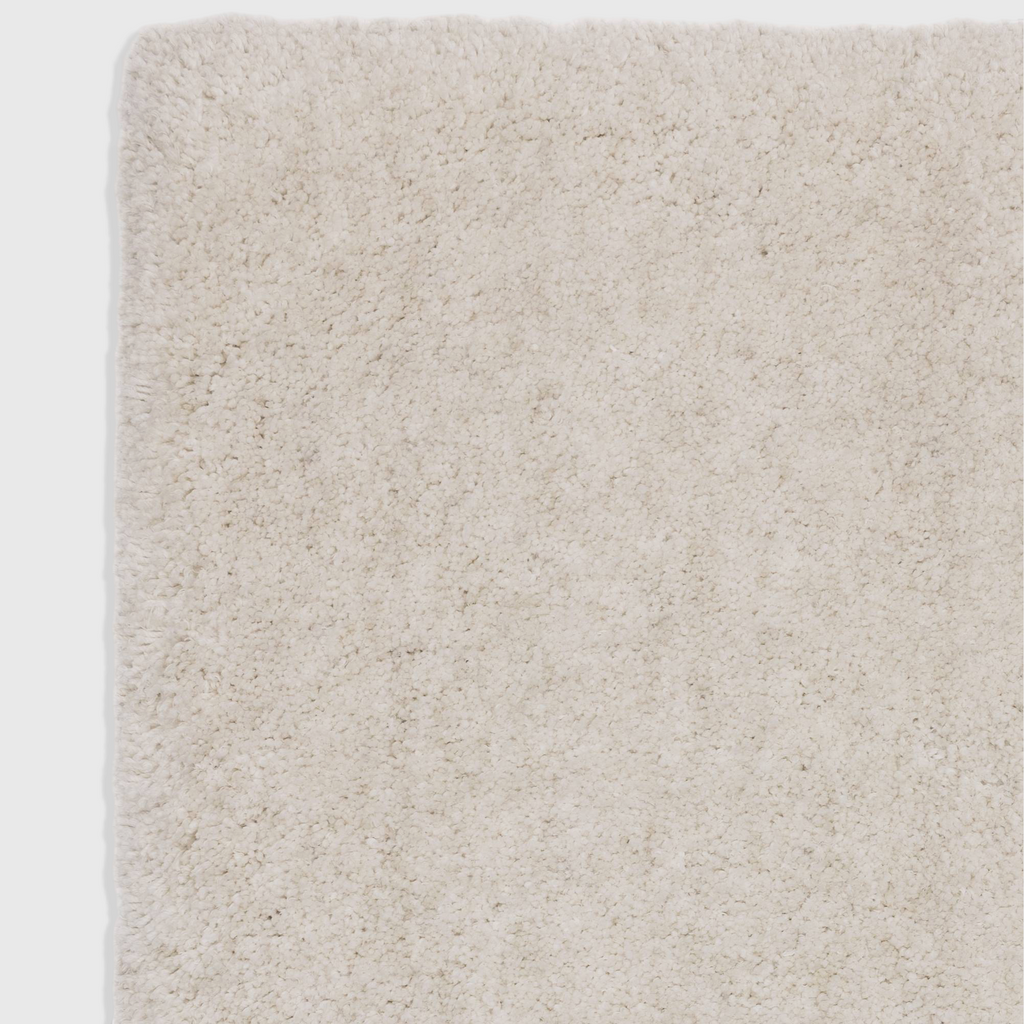 Alvo Rugs Barnett off white shaggy rug with a deep pile hand woven microfibre polyester texture
