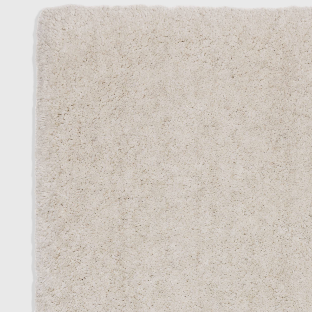 Alvo Rugs Barnett off white shaggy rug with a deep pile hand woven microfibre polyester texture