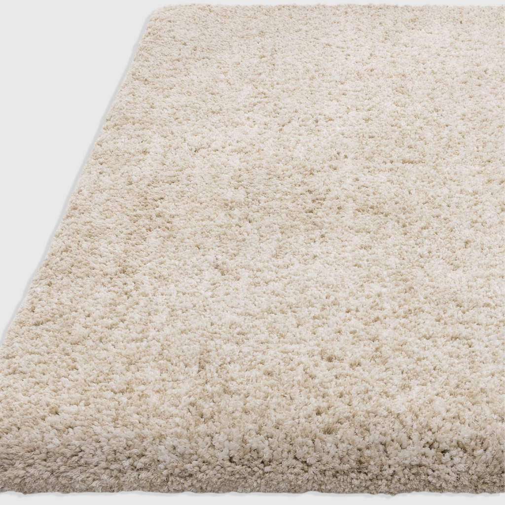 Alvo Rugs Barnett sand beige shaggy rug with a deep 7cm pile made from soft hand-woven microfibre polyester