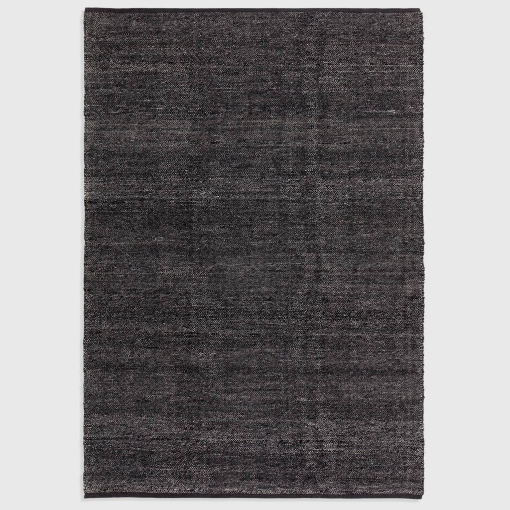 Alvo Rugs Birkley Indigo hand-woven wool and polyester flatweave rug in dark blue with subtle colour striations.