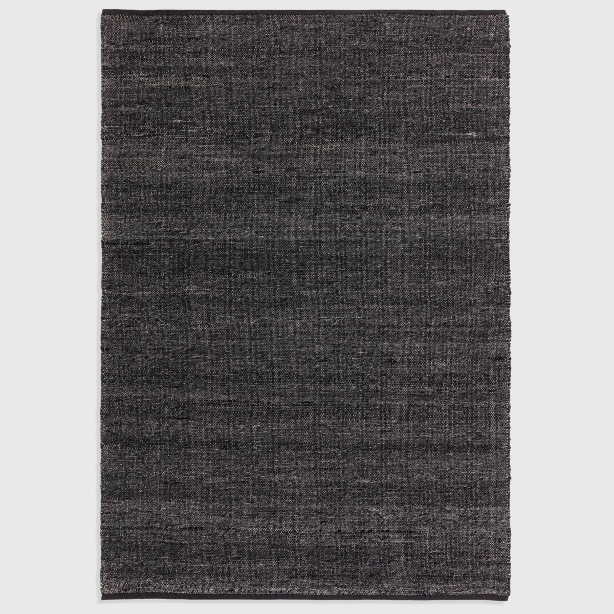 Alvo Rugs Birkley Indigo hand-woven wool and polyester flatweave rug in dark blue with subtle colour striations.