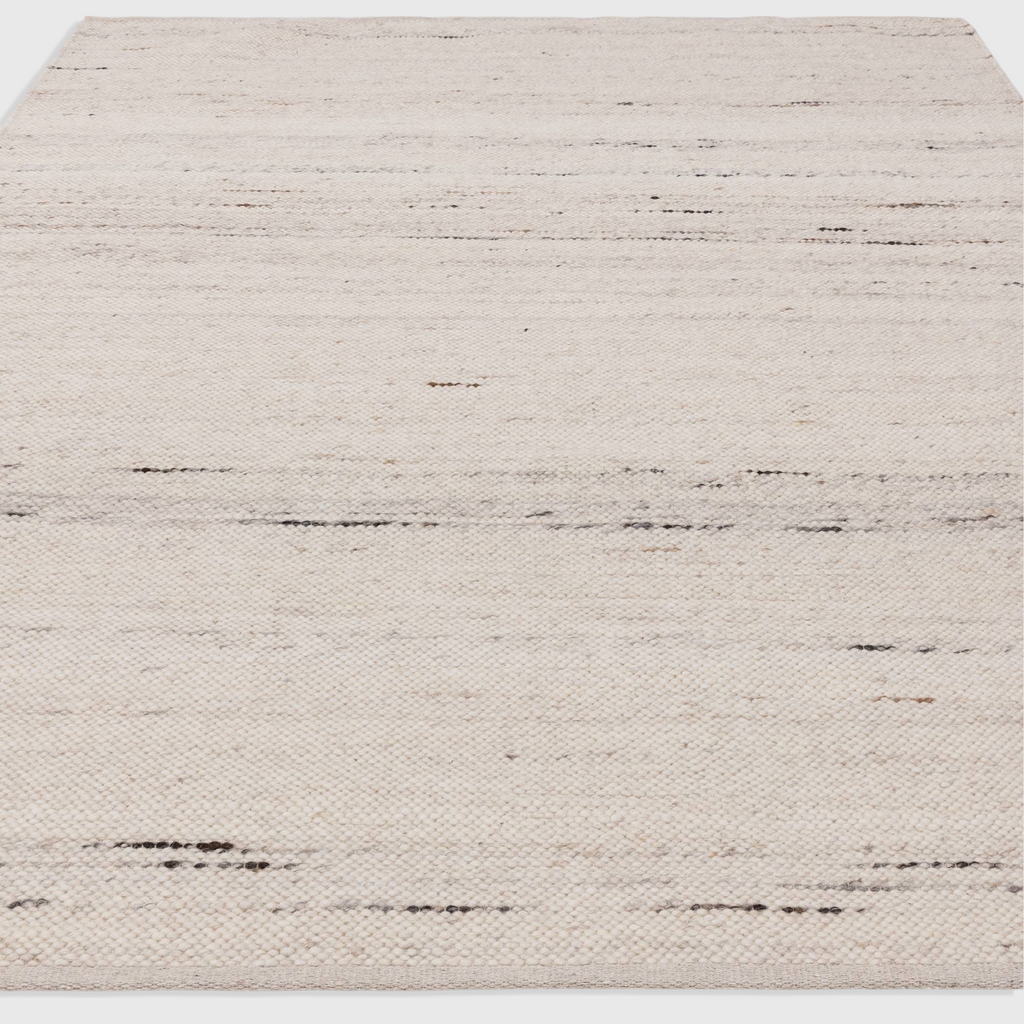 Alvo Rugs Birkley ivory hand-woven flatweave rug with subtle cream and dark grey striations in wool and polyester.