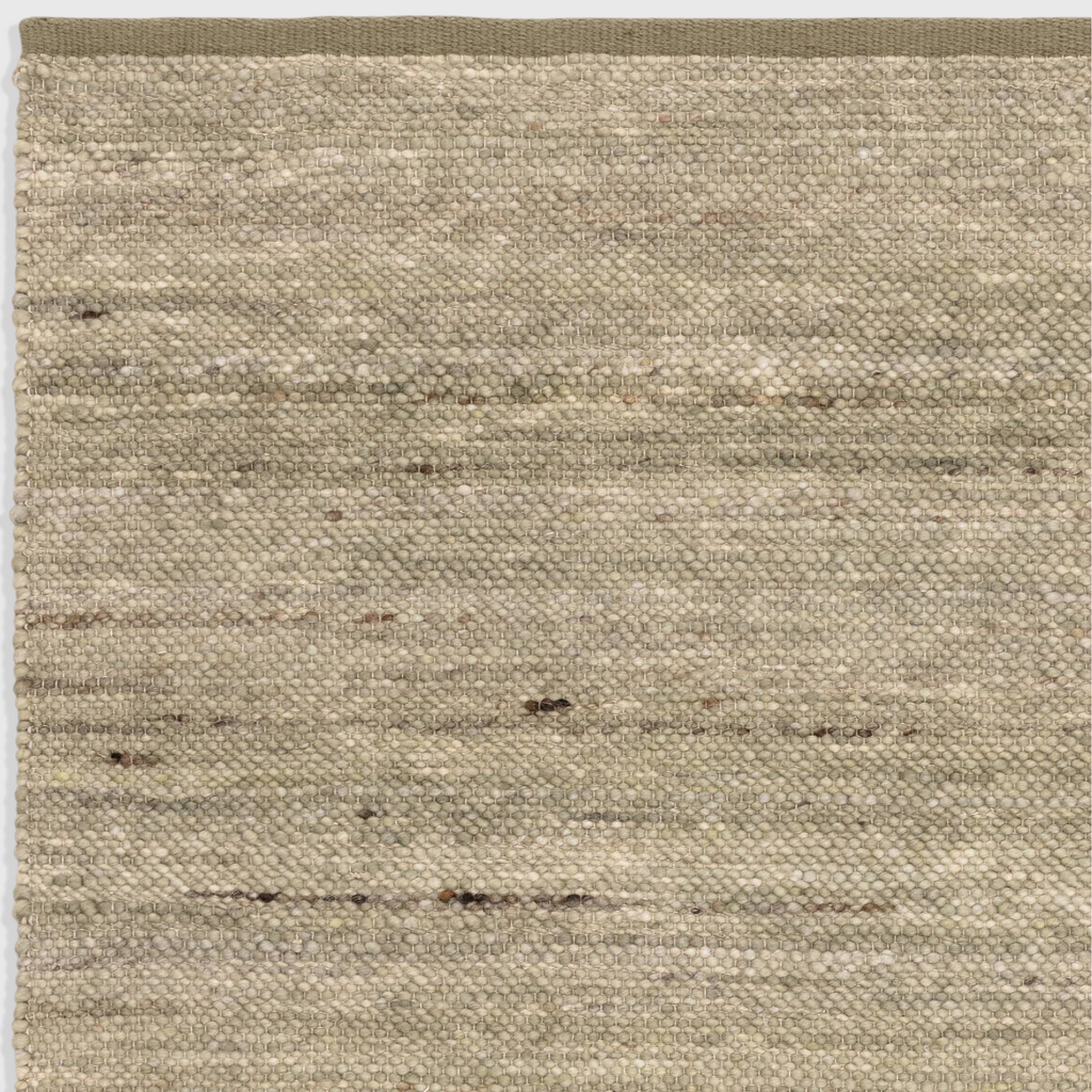 Alvo Rugs Birkley Pistachio hand-woven flatweave rug in green wool and polyester with subtle colour striations.