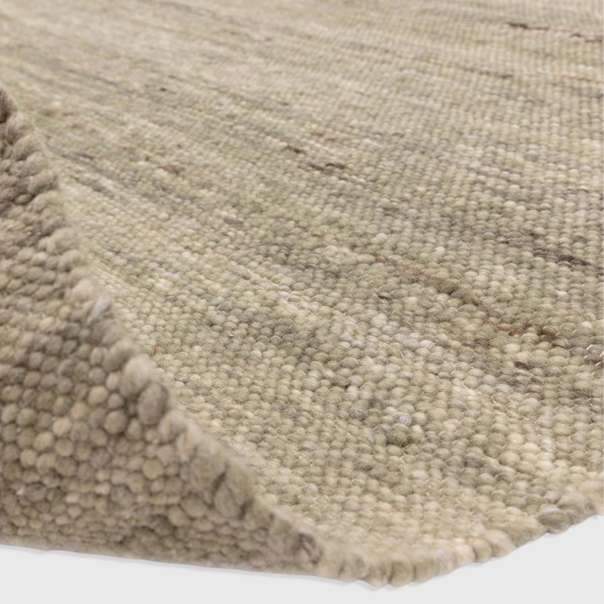 Alvo Rugs Birkley Pistachio rug featuring a hand-woven wool and polyester blend with a textured green flatweave pile.