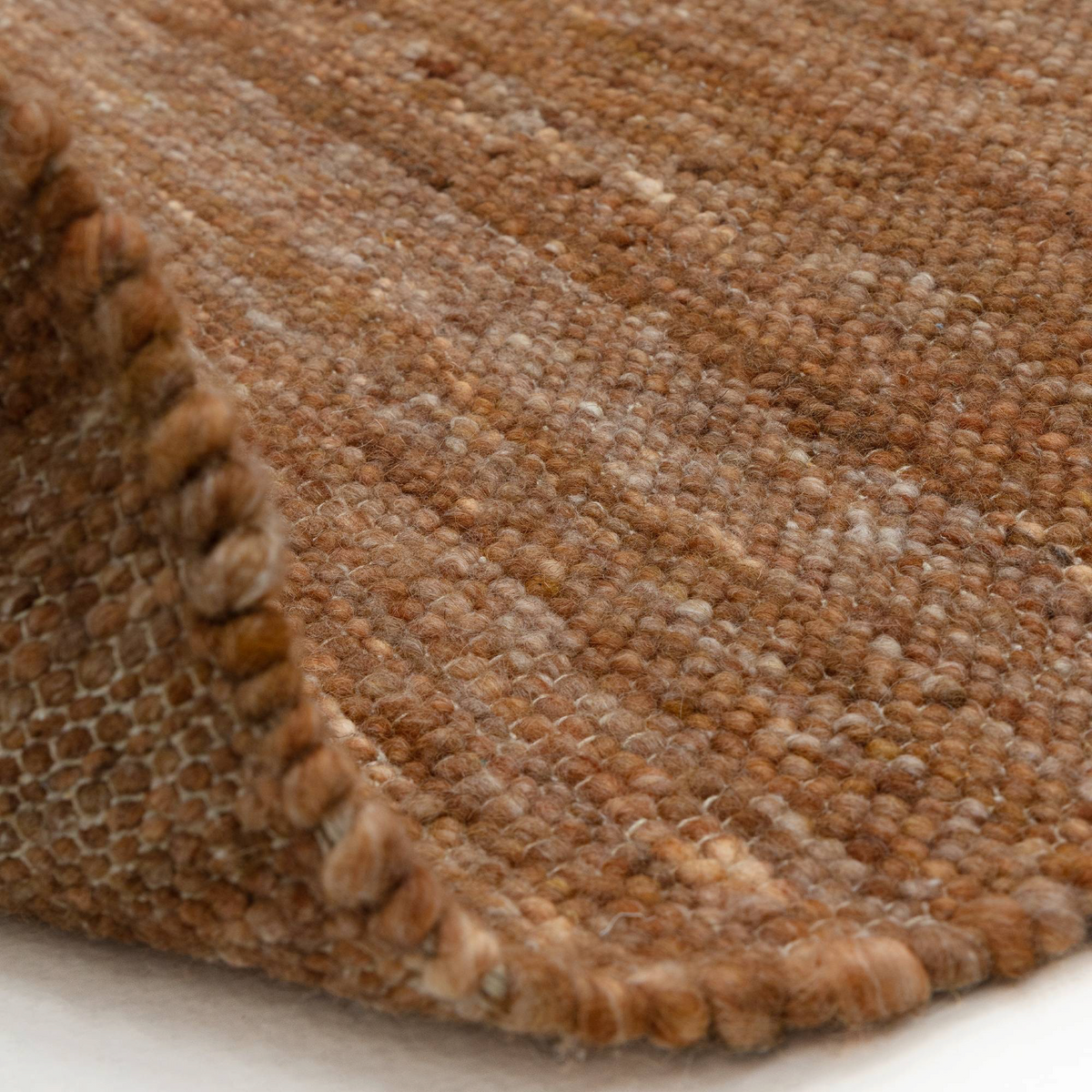 Alvo Rugs Birkley rust orange hand woven wool and polyester flatweave rug showing textured detail and edge