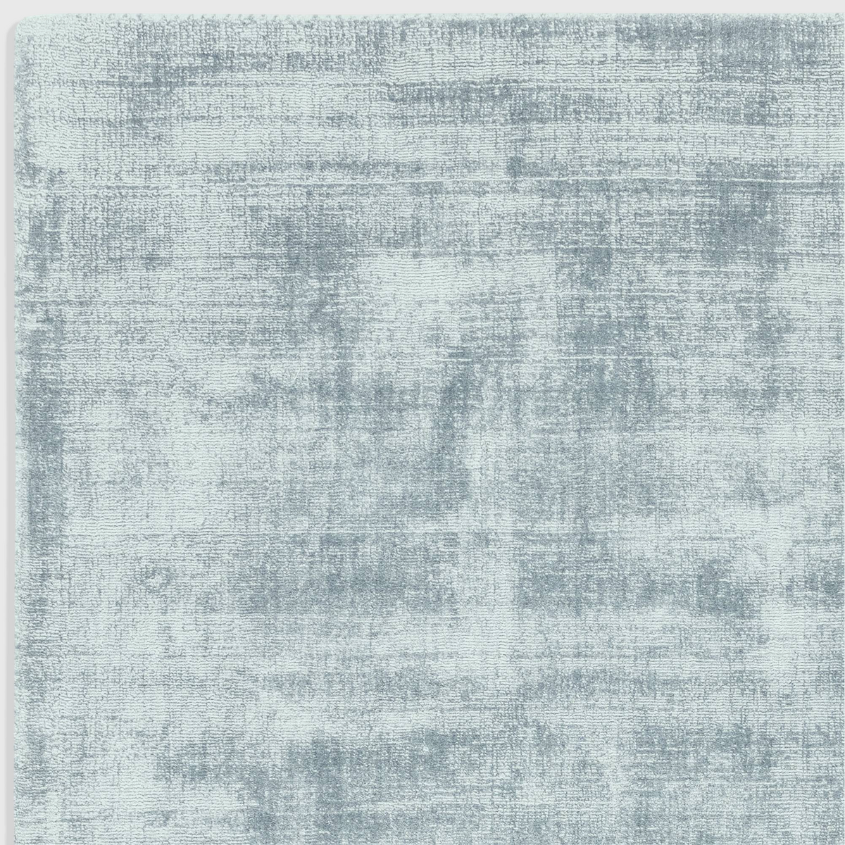 Alvo Rugs Blayde hand-woven viscose rug in airforce blue with a vintage-inspired tip-sheared texture.