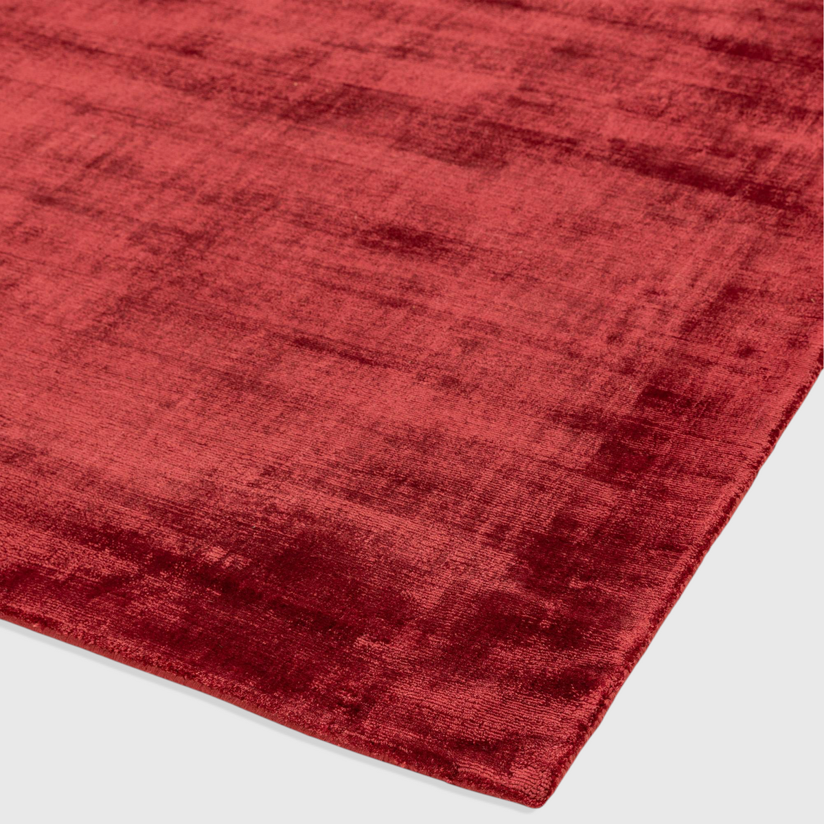 Alvo Rugs Blayde Berry hand-woven viscose rug in a deep red tone with a soft, vintage-inspired tip-sheared texture.