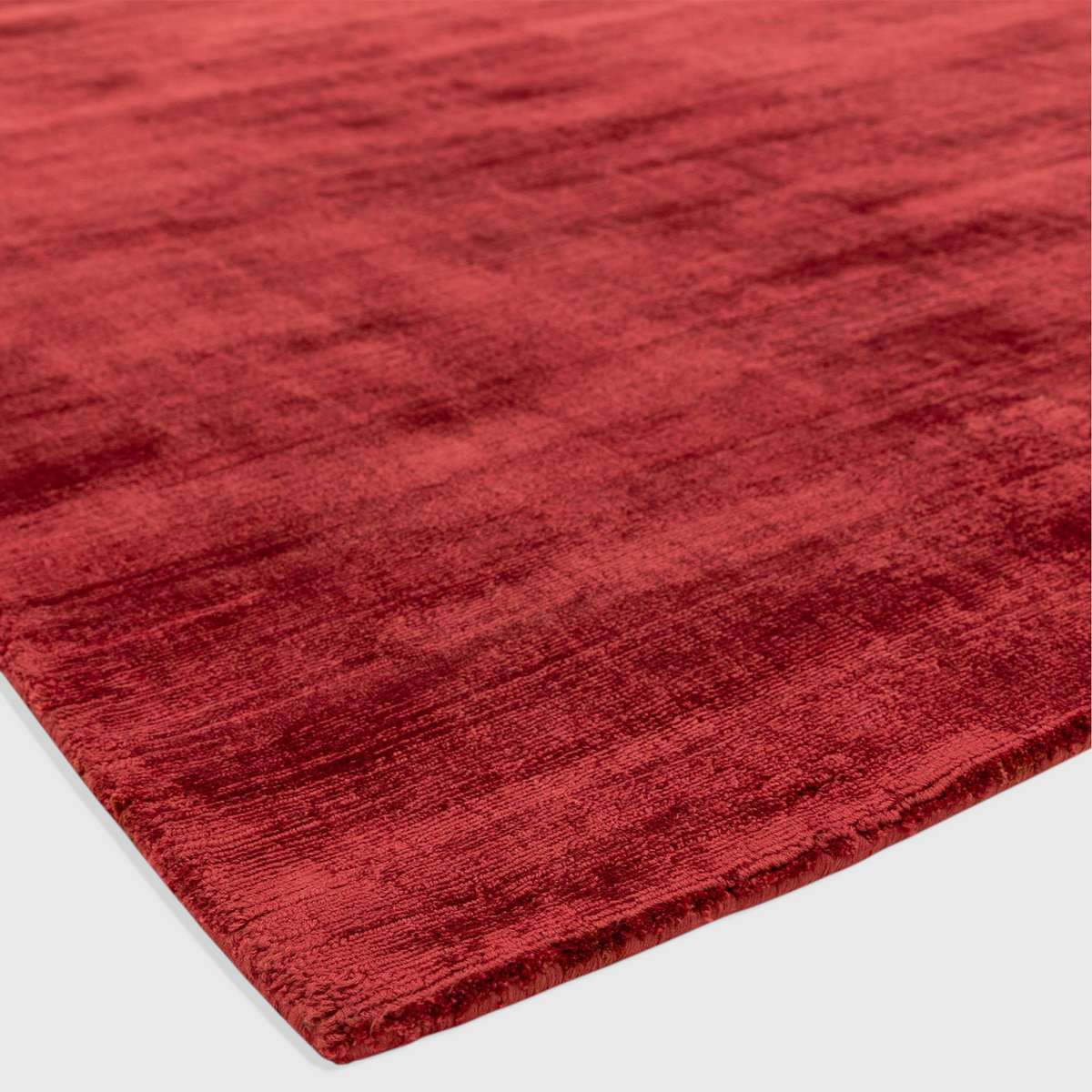 Alvo Rugs Blayde Berry hand-woven viscose rug in a deep red tone with a soft, vintage-inspired tip-sheared texture.