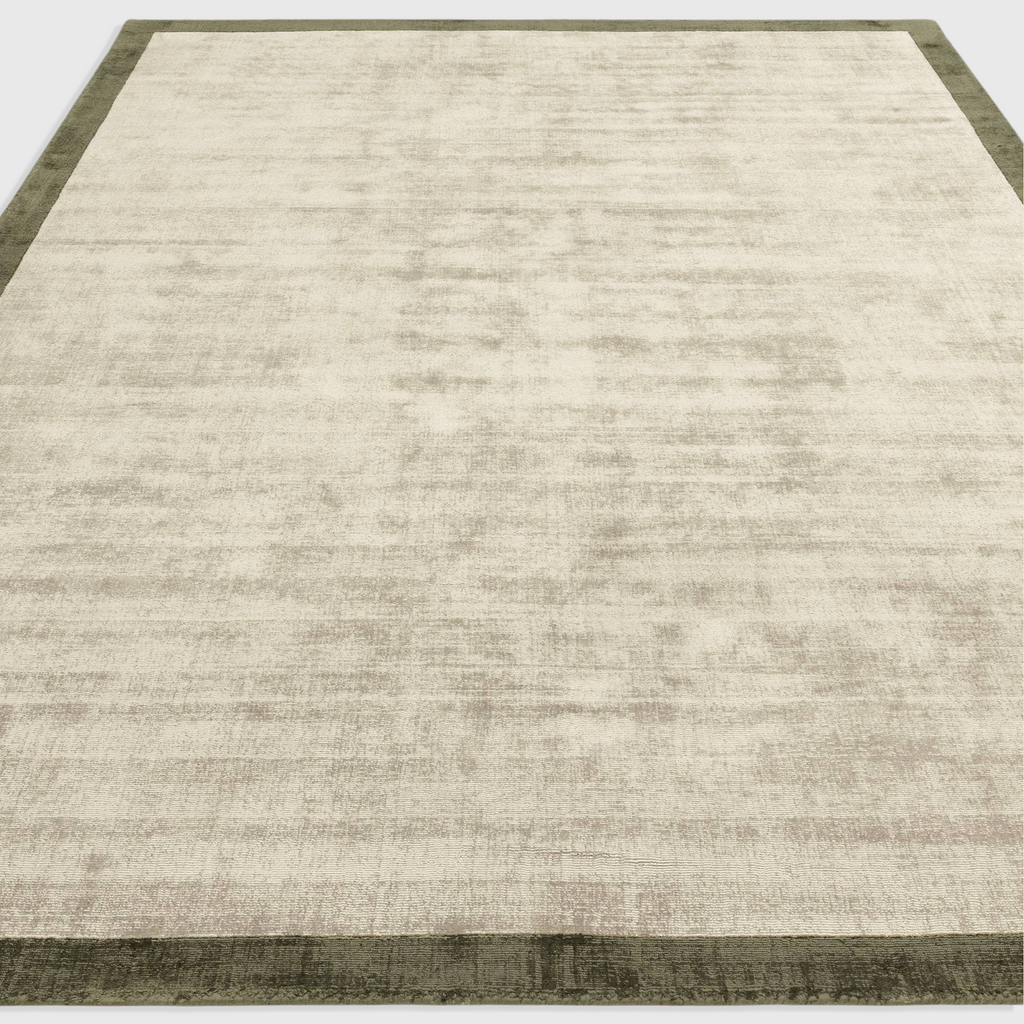 Alvo Rugs Blayde sage and olive green hand-woven viscose rug with a two-tone border and soft textured finish.