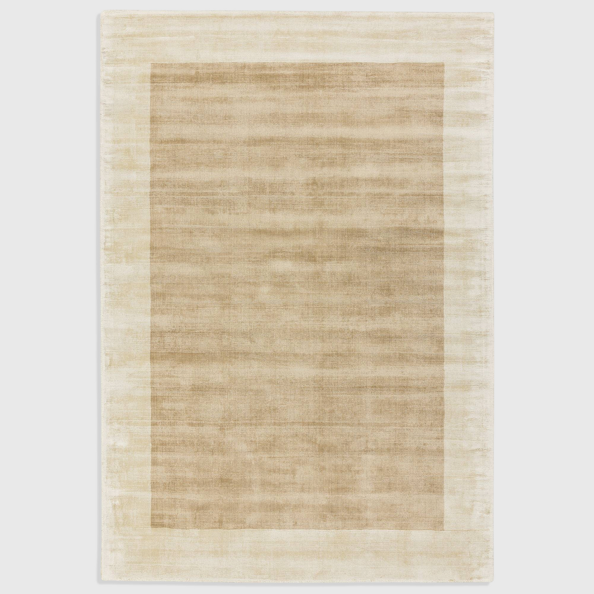 Alvo Rugs Blayde handwoven viscose rug in putty and champagne with a thick contrasting border and tip-sheared finish.