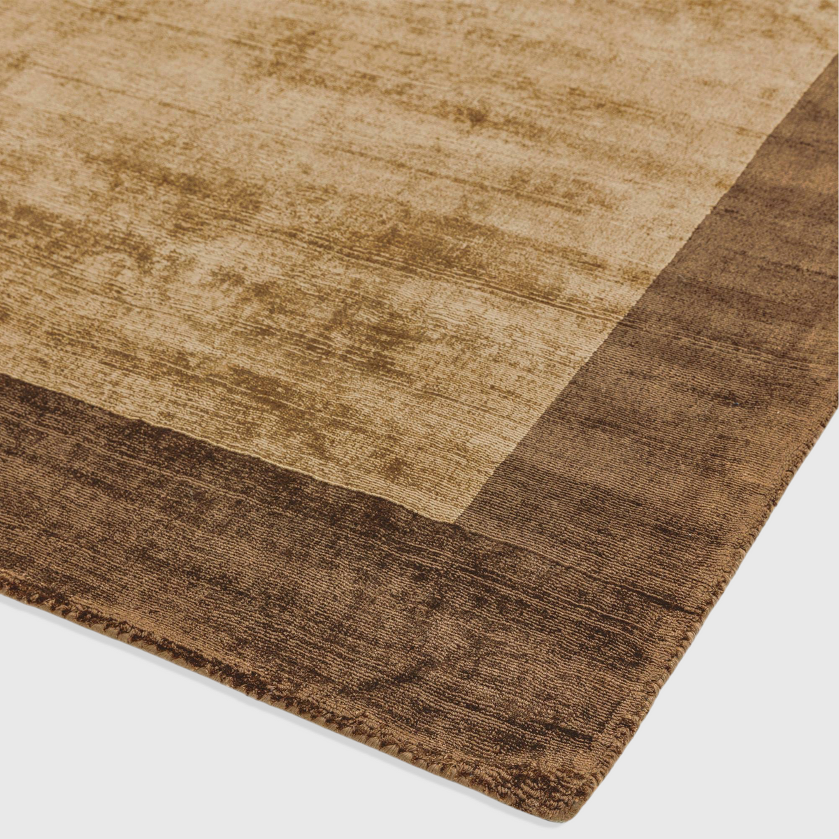 Alvo Rugs Blayde handwoven viscose rug in choco and mocha brown with a thick contrasting border and tip-sheared finish.