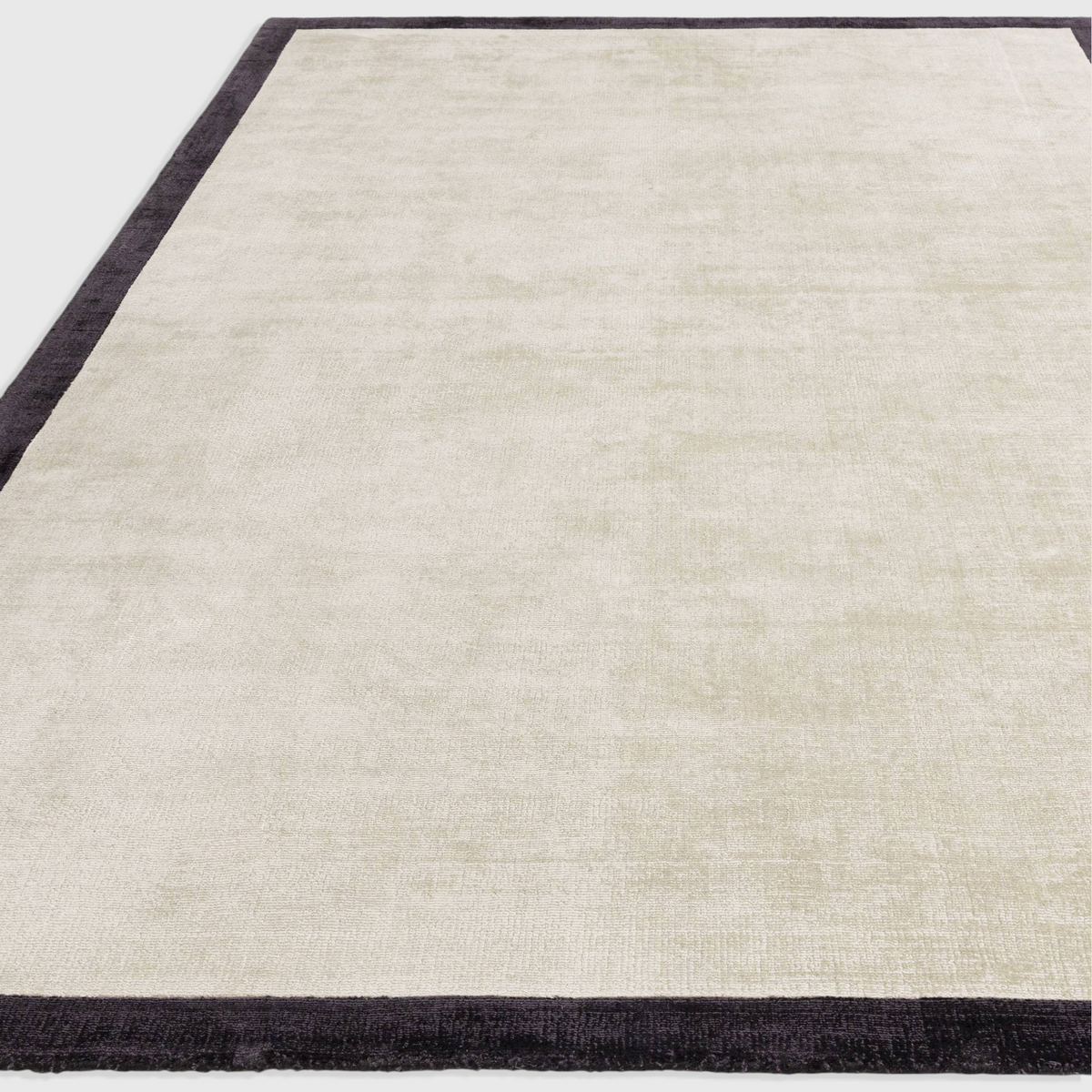 Alvo Rugs Blayde hand woven viscose rug in putty and charcoal with a two-tone border design.