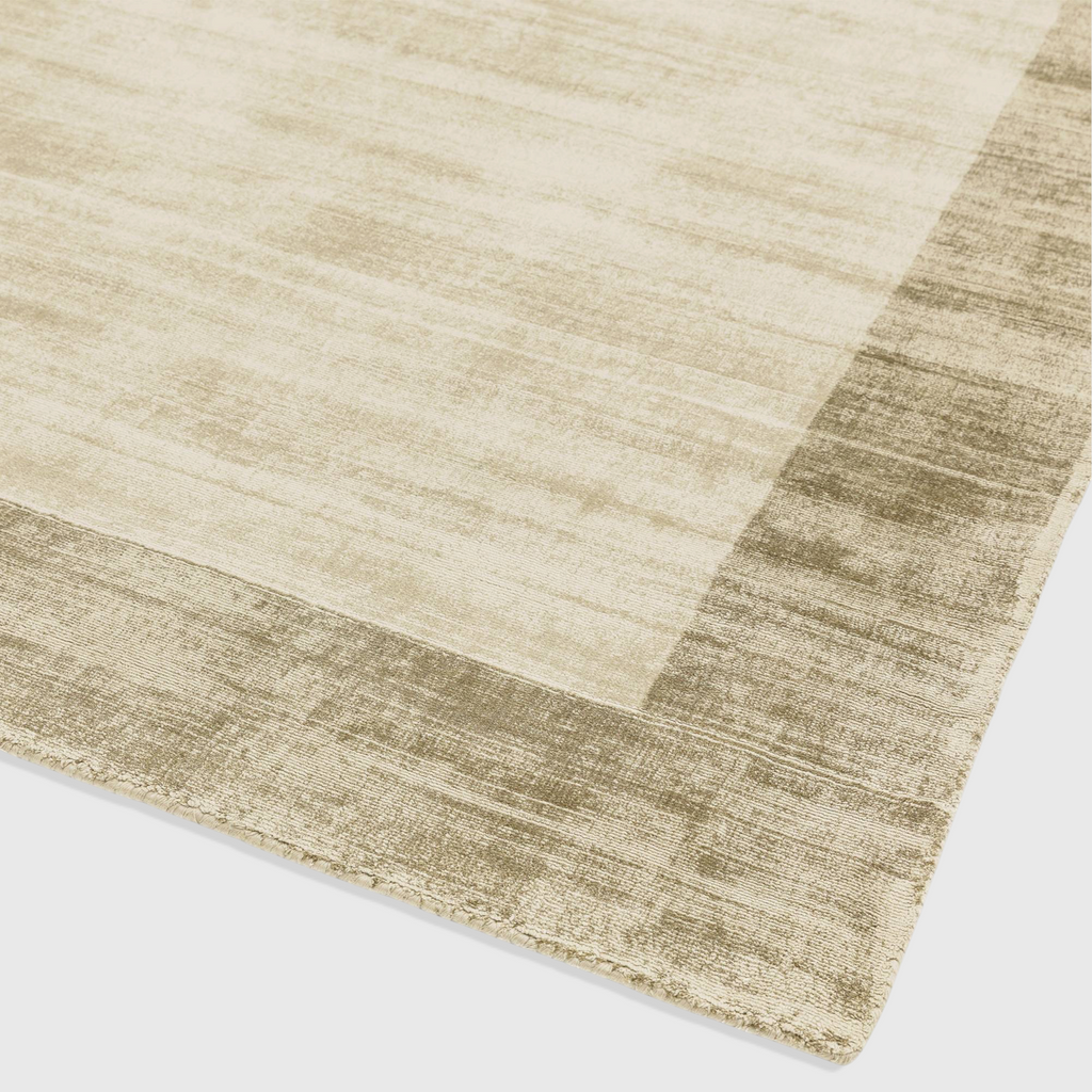 Alvo Rugs Blayde handwoven viscose rug in smoke and putty grey tones featuring a thick contrasting border design.