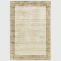 Alvo Rugs Blayde handwoven viscose area rug in smoke and putty with a contrasting border and tip-sheared texture.