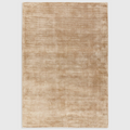 Alvo Rugs Blayde champagne beige hand-woven viscose rug with a vintage tip-sheared texture and plain aesthetic.