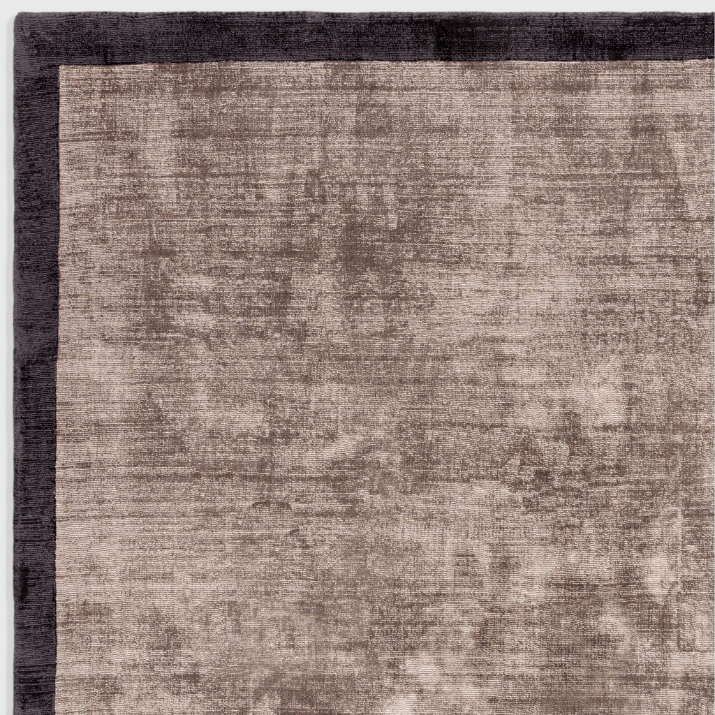 Alvo Rugs Blayde charcoal and moleskin viscose rug with a dark border and soft tip-sheared textured centre