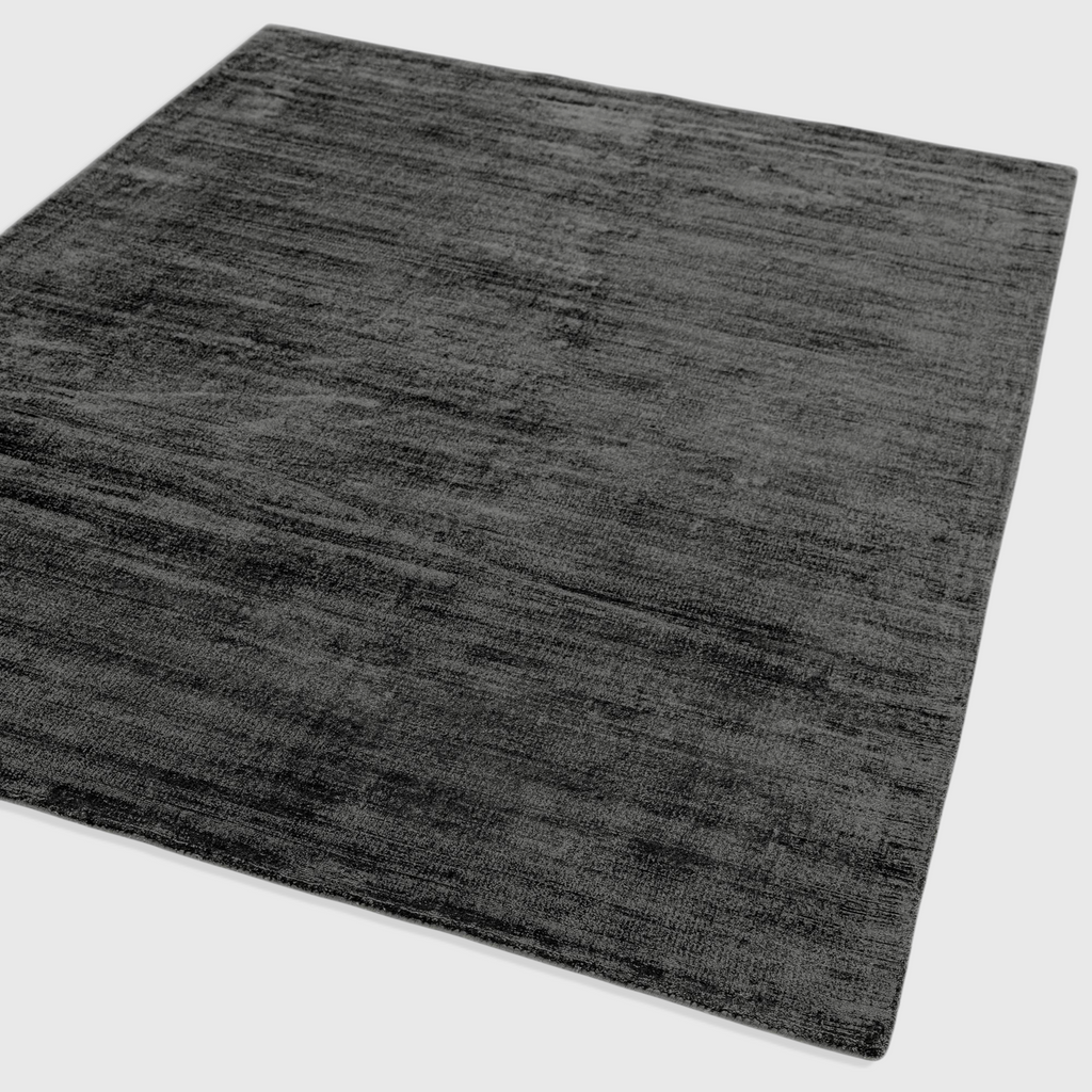 Alvo Rugs Blayde charcoal grey hand-woven viscose rug with a vintage tip-sheared texture and soft loop pile finish.