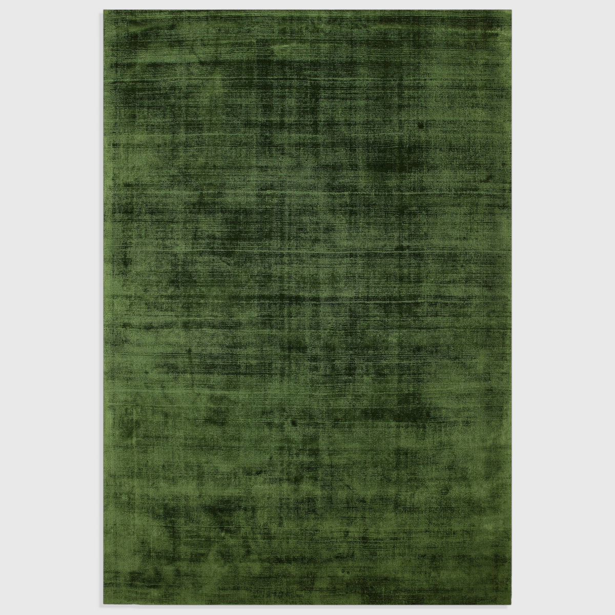 Alvo Rugs Blayde green hand-woven viscose rug with a vintage tip-sheared texture and soft loop pile finish.