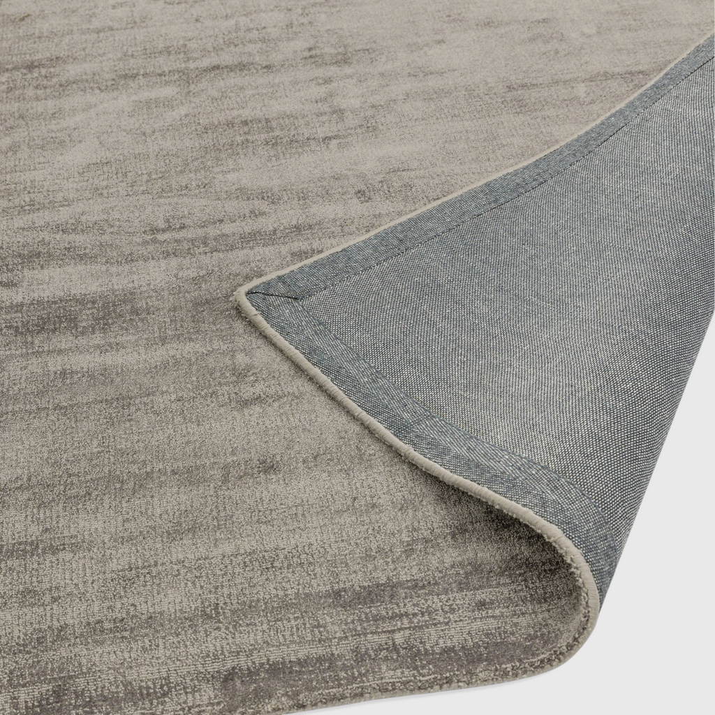 Alvo Rugs Blayde moleskin rug in beige showing the soft viscose pile and durable cotton polyester backing