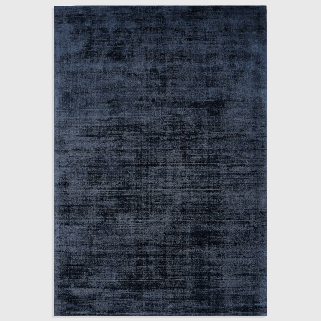 Alvo Rugs Blayde navy blue hand-woven viscose rug with a vintage tip-sheared finish and soft texture.