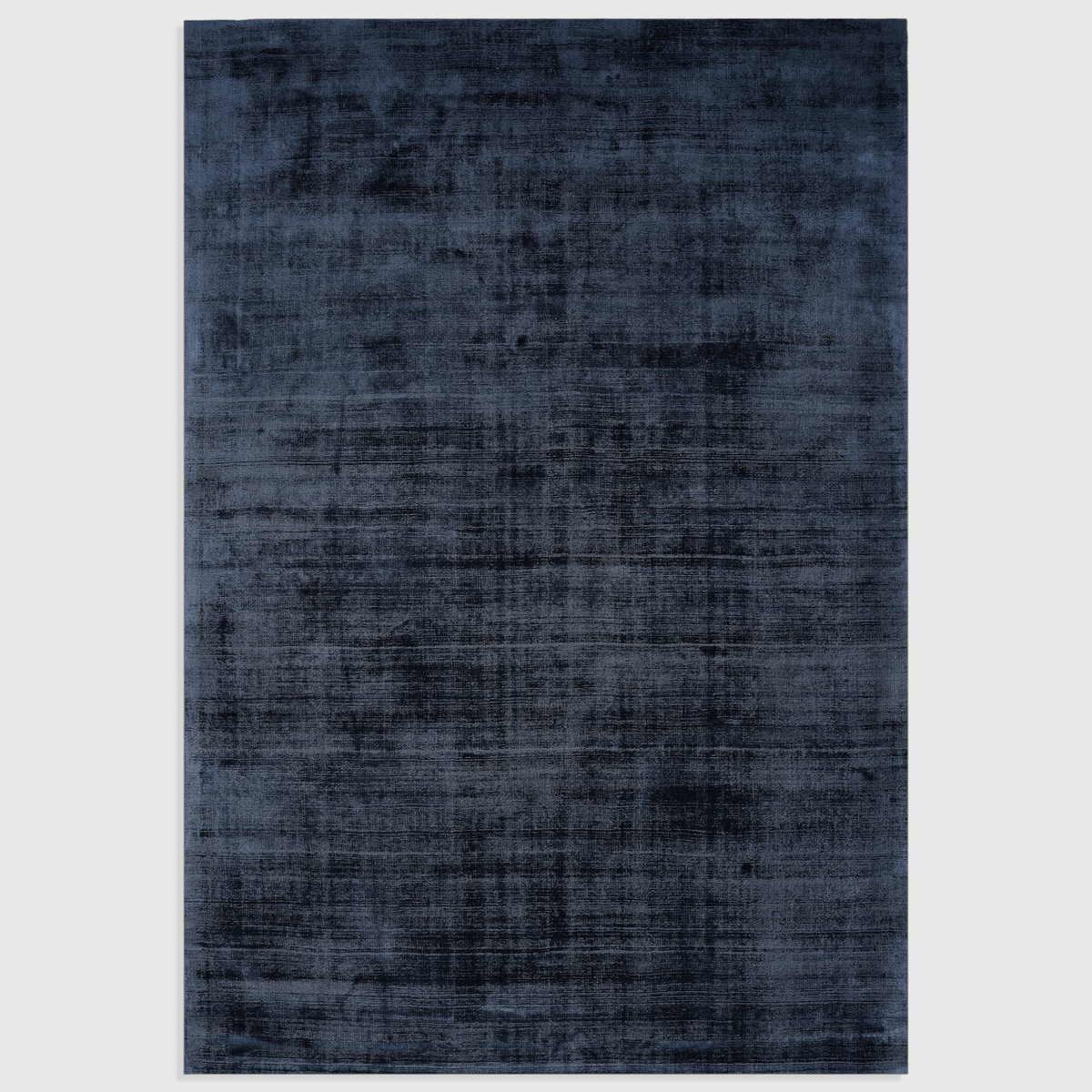 Alvo Rugs Blayde navy blue hand-woven viscose rug with a vintage tip-sheared finish and soft texture.